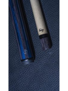 a close up of a cue stick